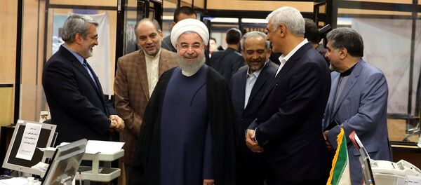 Iran's President Hassan Rouhani visits the election office in Tehran, Iran, May 19, 2017. Picture taken May 19, 2017 Iran's President Hassan Rouhani visits the election office in Tehran, Iran, May 19, 2017. Picture taken May 19, 2017 - Sputnik International