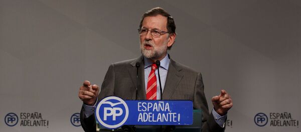 Spain's Prime Minister Mariano Rajoy gestures during a news conference at his ruling People's Party's (PP) headquarters in Madrid, Spain May 22, 2017 Spain's Prime Minister Mariano Rajoy gestures during a news conference at his ruling People's Party's (PP) headquarters in Madrid, Spain May 22, 2017 - Sputnik International