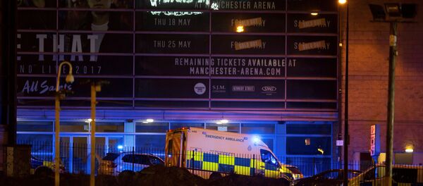 A police van and an ambulance are seen outside the Manchester Arena, where U.S. singer Ariana Grande had been performing, in Manchester A police van and an ambulance are seen outside the Manchester Arena, where U.S. singer Ariana Grande had been performing, in Manchester - Sputnik International