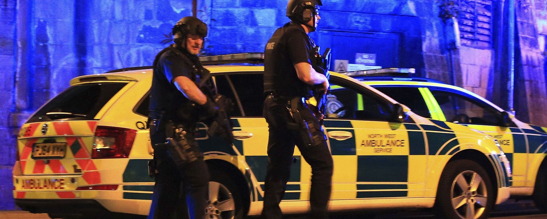 Armed police work at Manchester Arena after reports of an explosion at the venue during an Ariana Grande gig in Manchester, England Monday, May 22, 2017. - Sputnik International, 1920, 23.05.2017