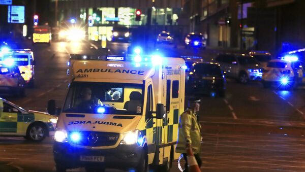 Emergency responders outside Manchester Arena after reports of an explosion at the venue during an Ariana Grandeconcert in Manchester, England, Monday, May 22, 2017. - Sputnik International