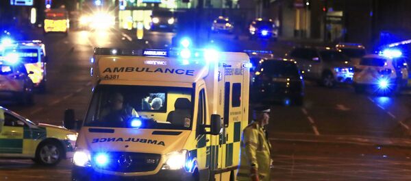 Emergency responders outside Manchester Arena after reports of an explosion at the venue during an Ariana Grandeconcert in Manchester, England, Monday, May 22, 2017. - Sputnik International