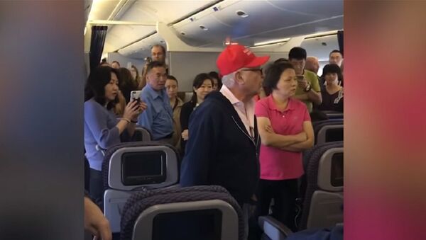 A belligerent man in a Trump hat was kicked off a flight - Sputnik International
