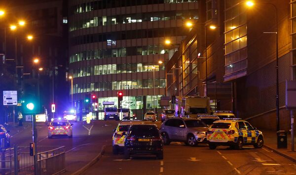 Vehicles are seen near a police cordon outside the Manchester Arena, where U.S. singer Ariana Grande had been performing, in Manchester, northern England, Britain, May 23, 2017. Vehicles are seen near a police cordon outside the Manchester Arena, where U.S. singer Ariana Grande had been performing, in Manchester, northern England, Britain, May 23, 2017. - Sputnik International