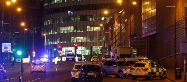 Vehicles are seen near a police cordon outside the Manchester Arena, where U.S. singer Ariana Grande had been performing, in Manchester, northern England, Britain, May 23, 2017. Vehicles are seen near a police cordon outside the Manchester Arena, where U.S. singer Ariana Grande had been performing, in Manchester, northern England, Britain, May 23, 2017. - Sputnik International