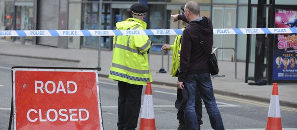 Police block a road near to the Manchester Arena in central Manchester, England Tuesday, May 23, 2017. Police block a road near to the Manchester Arena in central Manchester, England Tuesday, May 23, 2017. - Sputnik International