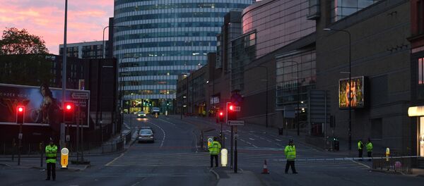 Police stand guard at the scene of a suspected terrorist attack during a pop concert by US star Ariana Grande in Manchester, northwest England on May 23, 2017. Police stand guard at the scene of a suspected terrorist attack during a pop concert by US star Ariana Grande in Manchester, northwest England on May 23, 2017. - Sputnik International