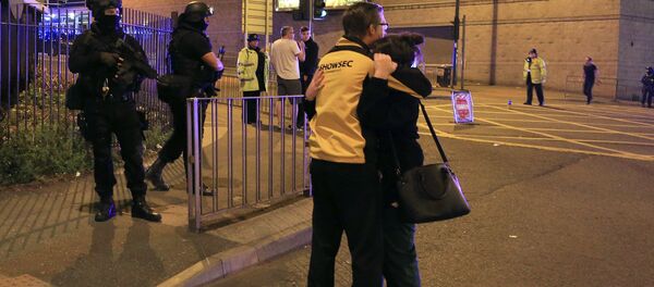 Armed police stand guard at Manchester Arena after reports of an explosion at the venue during an Ariana Grande gig in Manchester, England Monday, May 22, 2017. Armed police stand guard at Manchester Arena after reports of an explosion at the venue during an Ariana Grande gig in Manchester, England Monday, May 22, 2017. - Sputnik International