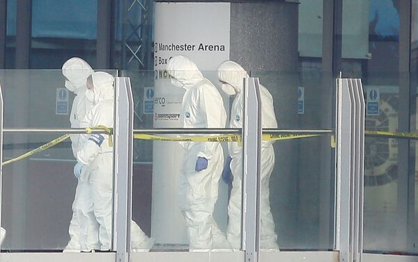 Forensics investigators work at the entrance of the Manchester Arena, Britain May 23, 2017. - Sputnik International