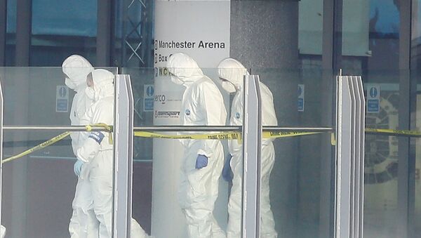Forensics investigators work at the entrance of the Manchester Arena, Britain May 23, 2017. - Sputnik International