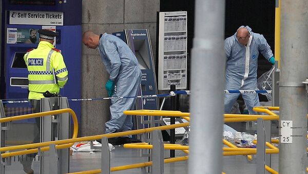 Forensics investigators work at the Manchester Arena in Manchester, Britain - Sputnik International