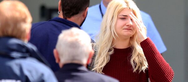 People walk out of a support centre at Manchester City's Etihad Stadium, Manchester, Britain, May 23, 2017. People walk out of a support centre at Manchester City's Etihad Stadium, Manchester, Britain, May 23, 2017. - Sputnik International