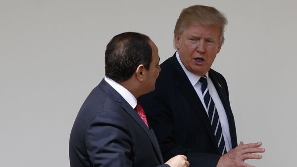 President Donald Trump walks with Egyptian President Abdel Fattah al-Sisi at the White House in Washington, Monday, April 3, 2017. - Sputnik International