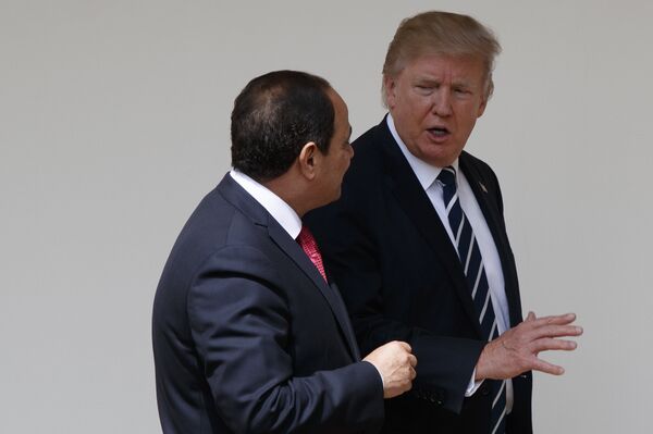 President Donald Trump walks with Egyptian President Abdel Fattah al-Sisi at the White House in Washington, Monday, April 3, 2017. - Sputnik International