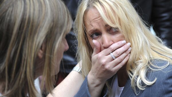 A member of the public reacts as police evacuate the Arndale shopping centre, in Manchester, England Tuesday May 23, 2017, the day after an apparent suicide bomber attacked an Ariana Grande concert as it ended Monday night, killing over a dozen of people among a panicked crowd of young concertgoers. - Sputnik International