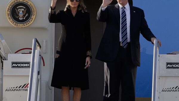 US President Donald Trump and his wife Melania arrive at Fiumicino's Leonardo Da Vinci International airport, near Rome, Tuesday, May 23, 2017. - Sputnik International