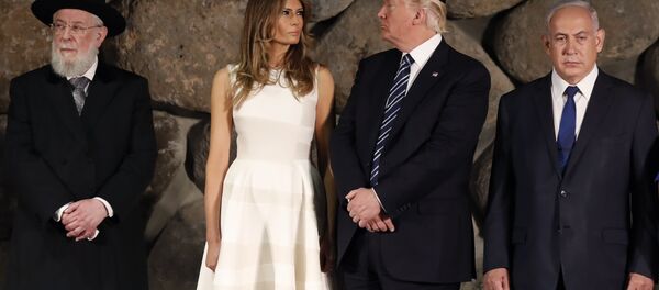 US President Donald Trump, center, first lady Melania Trump, center left, , Rabbi Israel Meir Lau, left, Israeli Prime Minister Benjamin Netanyahu are seen during a visit to the Yad Vashem Holocaust Memorial museum US President Donald Trump, center, first lady Melania Trump, center left, , Rabbi Israel Meir Lau, left, Israeli Prime Minister Benjamin Netanyahu are seen during a visit to the Yad Vashem Holocaust Memorial museum - Sputnik International