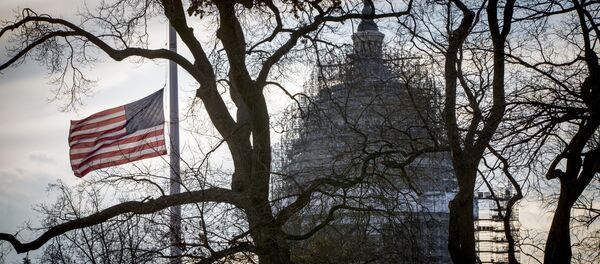 With the Capitol in the distance, the American flag flies at half-staff at the Supreme Court. (File) With the Capitol in the distance, the American flag flies at half-staff at the Supreme Court. (File) - Sputnik International