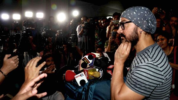 Indian Bollywood actor Aamir Khan interacts with the media during the promotion of the upcoming biographical sports drama Hindi film Dangal in Mumbai on November 28, 2016. - Sputnik International