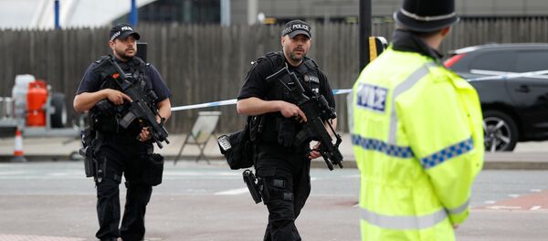 Armed police stand near the Manchester Arena in Manchester, Britain May 24, 2017. - Sputnik International