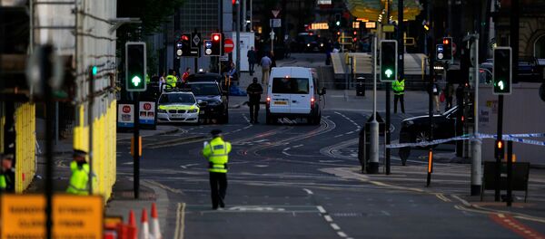 Police patrol the secure area outside the Manchester Arena in central Manchester, Britain May 23, 2017. - Sputnik International