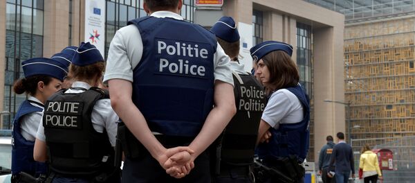 Belgian police officers patrol the area around the headquarters of different European institutions in Brussels, Belgium May 24, 2017. - Sputnik International