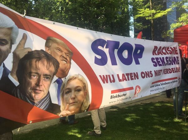 Protesters march in the center of Brussels  - Sputnik International