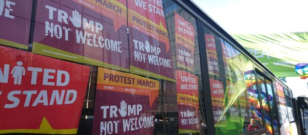Crowds protest the arrival of US President Donald Trump in Brussels on May 24. - Sputnik International
