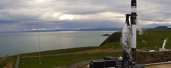 This photo supplied by Rocket Lab, shows the Electron rocket about to launch from the Mahia Peninsula in the North Island of New Zealand, Thursday, May 25, 2017. This photo supplied by Rocket Lab, shows the Electron rocket about to launch from the Mahia Peninsula in the North Island of New Zealand, Thursday, May 25, 2017. - Sputnik International