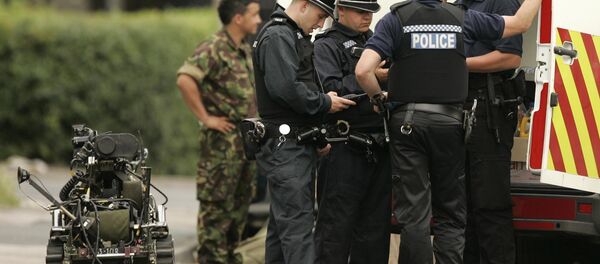 Policemen and an army bomb disposal team member. (File) Policemen and an army bomb disposal team member. (File) - Sputnik International