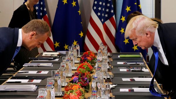 U.S. President Donald Trump (R) and the President of the European Council Donald Tusk take their seats before their meeting at the European Union headquarters in Brussels, Belgium, May 25, 2017. - Sputnik International
