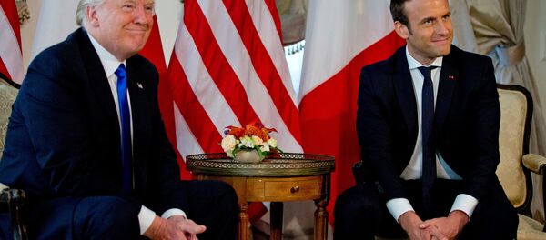 US President Donald Trump (L) meets French President Emmanuel Macron before a working lunch ahead of a NATO Summit in Brussels, Belgium, May 25, 2017 - Sputnik International