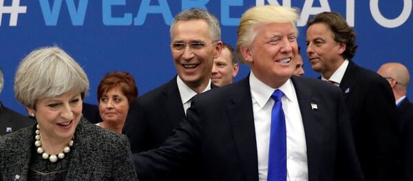 Britain's Foreign Secretary Boris Johnson (L), U.S. President Donald Trump (R) and Britain's Prime Minister Theresa May (C) attend a working dinner meeting at the NATO headquarters during a NATO summit of heads of state and government in Brussels, Belgium, May 25, 2017. - Sputnik International