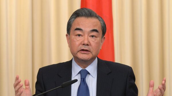 Foreign Minister of the People's Republic of China Wang Yi during a joint press conference with Russian Foreign Minister Sergey Lavrov on the results of their meeting in Moscow - Sputnik International