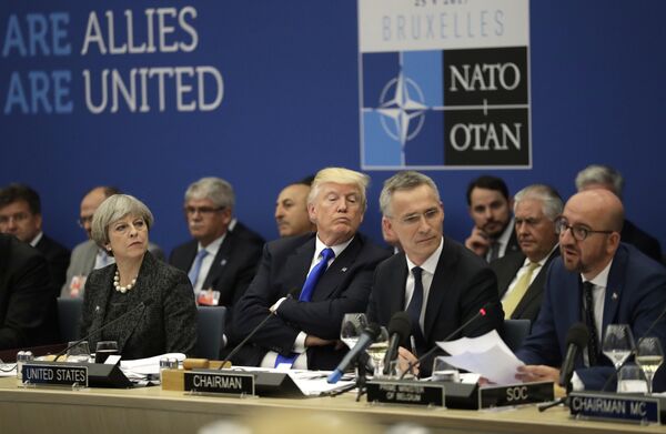 British Prime Minister Theresa May, U.S. President Donald Trump and NATO Secretary General Jens Stoltenberg listen to Belgian Prime Minister Charles Michel as he speaks during a working dinner meeting at the NATO headquarters during a NATO summit of heads of state and government in Brussels on Thursday, May 25, 2017 British Prime Minister Theresa May, U.S. President Donald Trump and NATO Secretary General Jens Stoltenberg listen to Belgian Prime Minister Charles Michel as he speaks during a working dinner meeting at the NATO headquarters during a NATO summit of heads of state and government in Brussels on Thursday, May 25, 2017 - Sputnik International