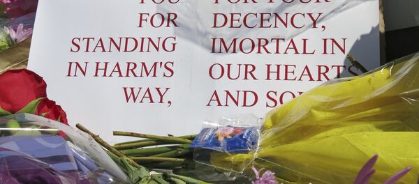 a memorial outside the transit center in Portland, Ore. on Saturday, May 27, 2017, for two bystanders who were stabbed to death Friday, while trying to stop a man who was yelling anti-Muslim slurs and acting aggressively toward two young women a memorial outside the transit center in Portland, Ore. on Saturday, May 27, 2017, for two bystanders who were stabbed to death Friday, while trying to stop a man who was yelling anti-Muslim slurs and acting aggressively toward two young women - Sputnik International