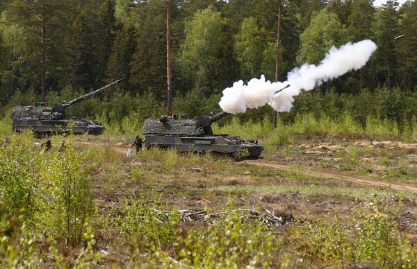 German army armoured hotwitzer 2000 fires during NATO enchanced Forward Presence Battle Group Lithuania live shooting exercise in Pabrade military training field, Lithuania, May 17, 2017 German army armoured hotwitzer 2000 fires during NATO enchanced Forward Presence Battle Group Lithuania live shooting exercise in Pabrade military training field, Lithuania, May 17, 2017 - Sputnik International