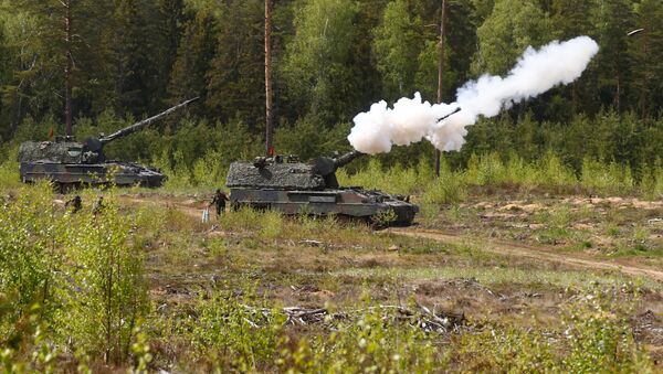 German army armoured hotwitzer 2000 fires during NATO enchanced Forward Presence Battle Group Lithuania live shooting exercise in Pabrade military training field, Lithuania, May 17, 2017 - Sputnik International