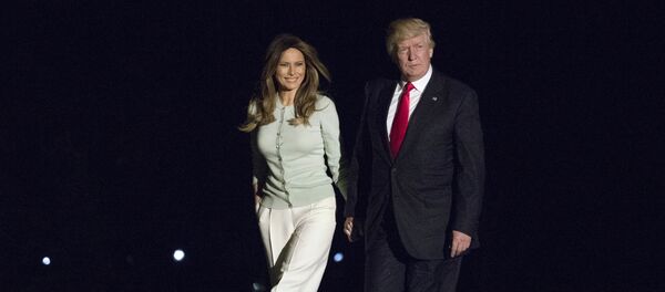 President Donald Trump and first lady Melania Trump walk from Marine One across the South Lawn to White House in Washington, Saturday, May 27, 2017, as they return from Sigonella, Italy President Donald Trump and first lady Melania Trump walk from Marine One across the South Lawn to White House in Washington, Saturday, May 27, 2017, as they return from Sigonella, Italy - Sputnik International