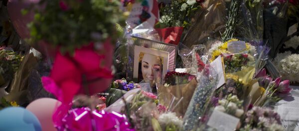 A portrait of Eilidh MacLeod, 14, who has been named as one of those who died in Monday's Manchester bombing, is seen at St Ann's Square in central Manchester, England, Friday, May 26 2017. A portrait of Eilidh MacLeod, 14, who has been named as one of those who died in Monday's Manchester bombing, is seen at St Ann's Square in central Manchester, England, Friday, May 26 2017. - Sputnik International