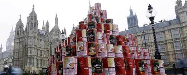 A pyramid of 468 cans of soup during a media event outside the Palace of Westminster to highlight food bank dependency. A pyramid of 468 cans of soup during a media event outside the Palace of Westminster to highlight food bank dependency. - Sputnik International