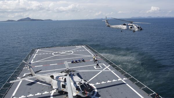 (File) A helicopter takes off from HTMS Angthonga helipad before a patrol demonstration to the media on a Thai naval ship in Phuket province Friday, May 29, 2015 - Sputnik International