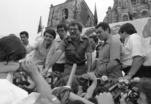 FILE - In this Oct. 28, 1984 file photo, Nicaraguan presidential candidate for the Sandinista National Liberation Front Daniel Ortega reaches out to supporters during a final campaign appearance in Leon, Nicaragua FILE - In this Oct. 28, 1984 file photo, Nicaraguan presidential candidate for the Sandinista National Liberation Front Daniel Ortega reaches out to supporters during a final campaign appearance in Leon, Nicaragua - Sputnik International