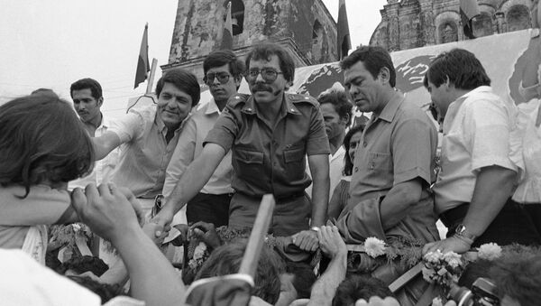 FILE - In this Oct. 28, 1984 file photo, Nicaraguan presidential candidate for the Sandinista National Liberation Front Daniel Ortega reaches out to supporters during a final campaign appearance in Leon, Nicaragua - Sputnik International