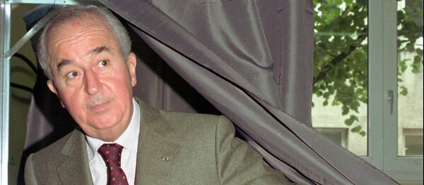 Former Prime Minister and presidential candidate Edouard Balladur leaves the polling booth before casting his ballot Sunday Sept.17, 1995 in Paris in a legislative election for which he is running - Sputnik International