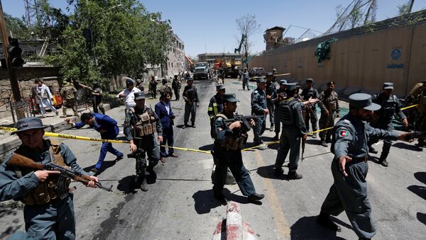 Afghan policemen inspect at the site of a blast in Kabul, Afghanistan May 31, 2017 - Sputnik International