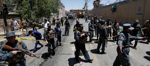 Afghan policemen inspect at the site of a blast in Kabul, Afghanistan May 31, 2017 Afghan policemen inspect at the site of a blast in Kabul, Afghanistan May 31, 2017 - Sputnik International