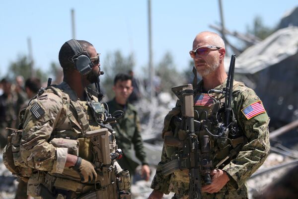 US forces are seen at the Kurdish People's Protection Units (YPG) headquarters after it was hit by Turkish airstrikes in Mount Karachok near Malikiya, Syria April 25, 2017. US forces are seen at the Kurdish People's Protection Units (YPG) headquarters after it was hit by Turkish airstrikes in Mount Karachok near Malikiya, Syria April 25, 2017. - Sputnik International