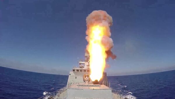 Russian frigate Admiral Essen launches Kalibr cruise missiles at ISIS facilities (the Islamic State international terrorist organization banned in Russia) near Palmyra. - Sputnik International