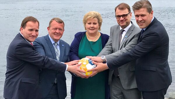 Sweden's Prime Minister Stefan Lofven (L-R), with his counterparts Lars Lokke Rasmussen of Denmark, Erna Solberg of Norway, Juha Sipila of Finland and Bjarni Benediktsson of Iceland hold a soccer ball during their meeting in Bergen, Norway May 29, 2017. Picture taken May 29, 2017. - Sputnik International